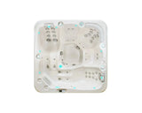 Witte 5-persoons jacuzzi met geïntegreerde zit- en ligplaatsen voor swimspa en jacuzzi buiten.