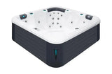 Moderne 5-persoons spa met wit binnenwerk en zwarte buitenkant, perfect als jacuzzi buiten of zwemspa voor ontspanning in de .